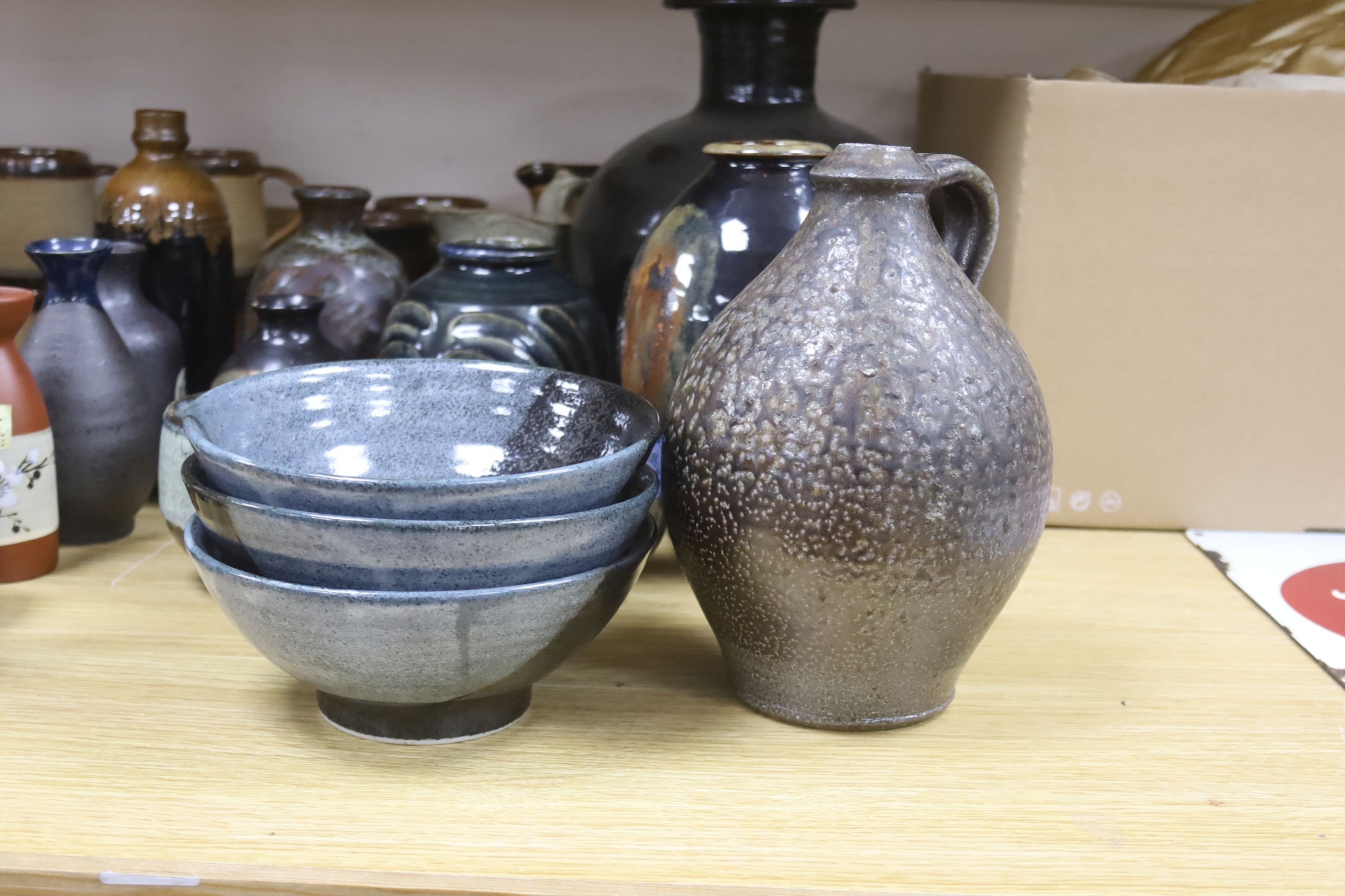 A collection of Studio pottery vases and a Bellarmine